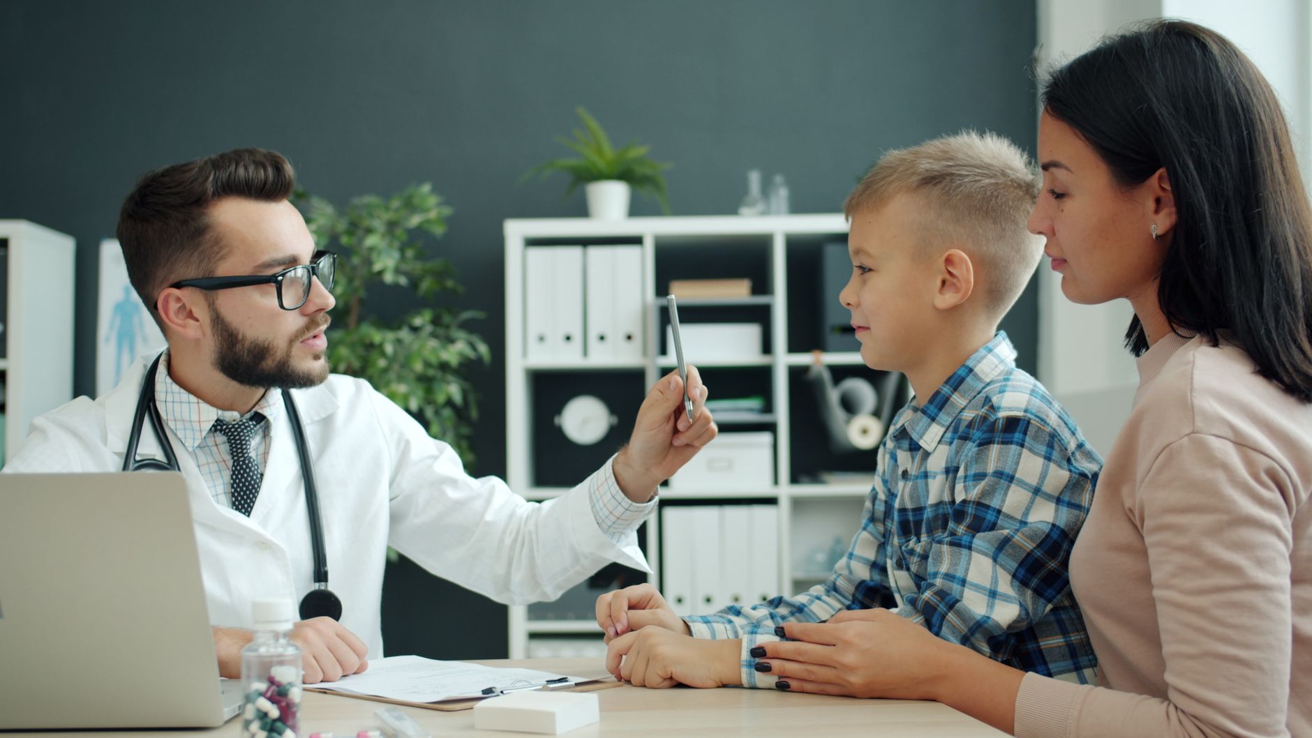 doctor s consultation with mother and child